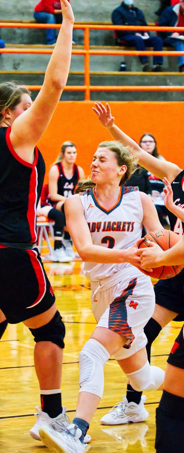 Mylee Fischer uses a eurostep to get around the defense. [shots available to print]